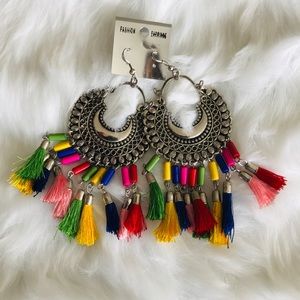 Silver tone hanging earring